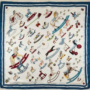 Hermès Cream Silk Scarf with Multicolor Toy Motif and Blue Script
